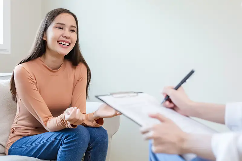 Woman meeting with coordinator to prepare for a safe and supported surrogacy journey